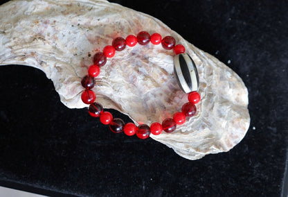 One of a kind Mexico red blood beeswax beads Certified 8mm. Combined with Crimson Burst Flower Stone and  Mother of Pearl Black.
