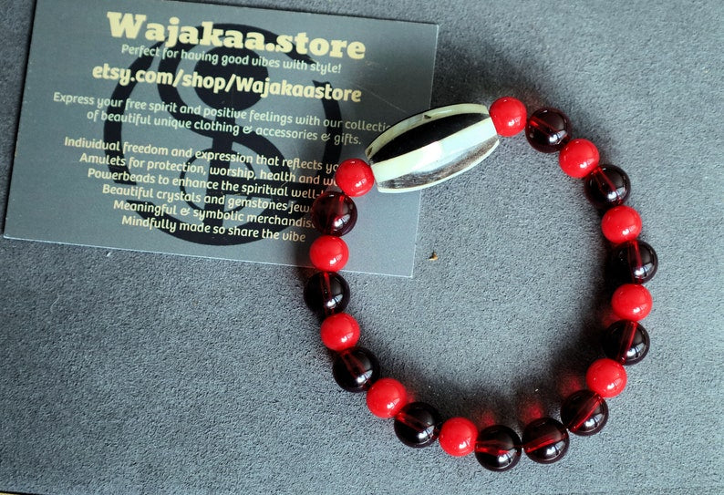 One of a kind Mexico red blood beeswax beads Certified 8mm. Combined with Crimson Burst Flower Stone and  Mother of Pearl Black.