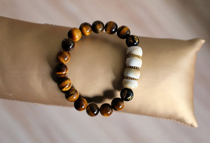 Large Apple Shell Heishi beads with large Apple Shell Heishi beads beads and 10mm Tiger eye.  into a state of calm aiding