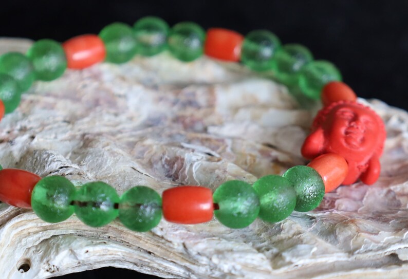 Beautiful Moldavite8 mm and Cinnabar Buddha and Real Red Coral rice beads. understanding life in the deepest way possible