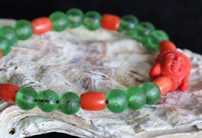Beautiful Moldavite8 mm and Cinnabar Buddha and Real Red Coral rice beads. understanding life in the deepest way possible