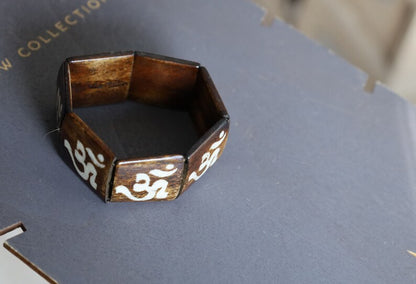 The bracelet is MAGICAL . This unique premium quality unisex elastic band bracelet with AUM.