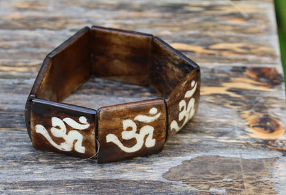 The bracelet is MAGICAL . This unique premium quality unisex elastic band bracelet with AUM.