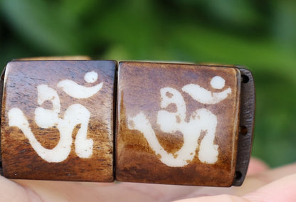 The bracelet is MAGICAL . This unique premium quality unisex elastic band bracelet with AUM.