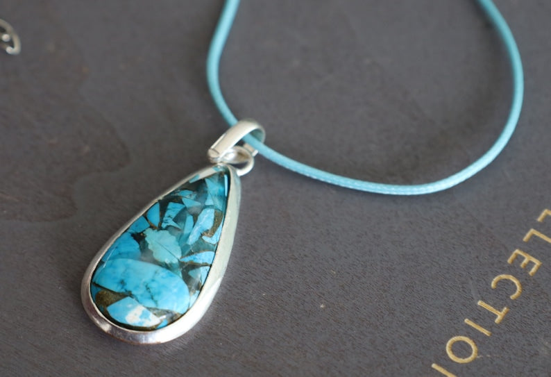 A natural Chrysocolla silver 925 pendant combines the symbolism of Chrysocolla as a gemstone and the design of a style necklace