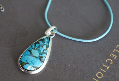 A natural Chrysocolla silver 925 pendant combines the symbolism of Chrysocolla as a gemstone and the design of a style necklace