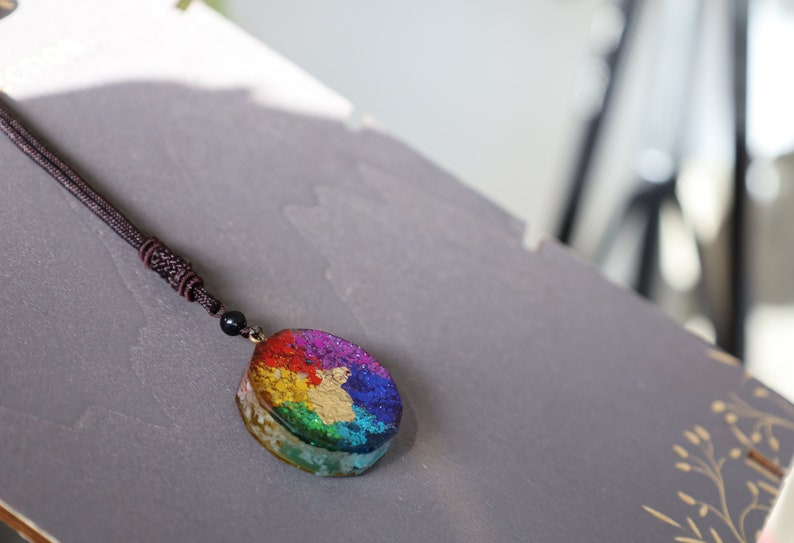 Orgonite, chakra, pendants including amethyst, lapis lazuli, turquoise, green aventurine, citrine, carnelian and Red jasper.