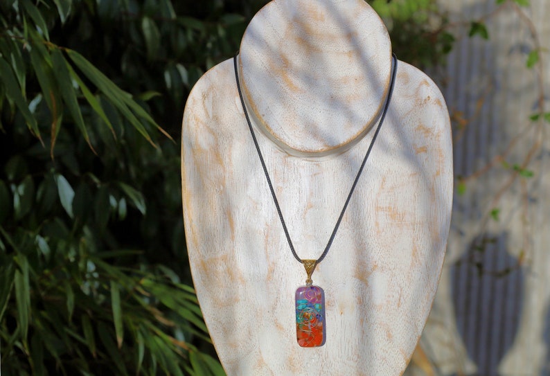 Orgonite, chakra, pendants including amethyst, lapis lazuli, turquoise, green aventurine, citrine, carnelian and Red jasper.