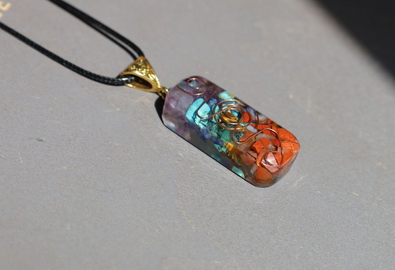 Orgonite, chakra, pendants including amethyst, lapis lazuli, turquoise, green aventurine, citrine, carnelian and Red jasper.