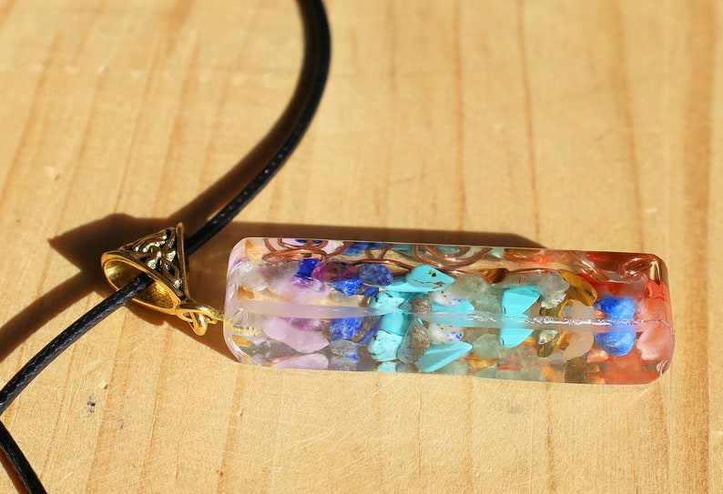 Orgonite, chakra, pendants including amethyst, lapis lazuli, turquoise, green aventurine, citrine, carnelian and Red jasper.