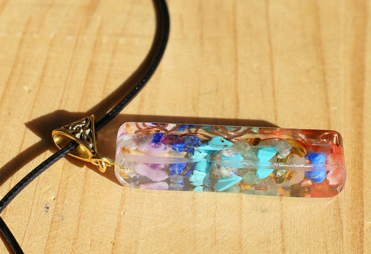 Orgonite, chakra, pendants including amethyst, lapis lazuli, turquoise, green aventurine, citrine, carnelian and Red jasper.