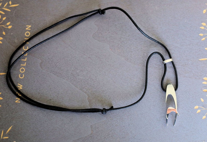 Chronotech Pendant with adjustable cord.  Silver steel. size 6mmx 41mm. weight 8gr. Chronotech is an Italian brand of watches