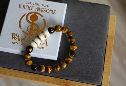 Large Apple Shell Heishi beads with large Apple Shell Heishi beads beads and 10mm Tiger eye.  into a state of calm aiding