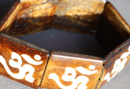 The bracelet is MAGICAL . This unique premium quality unisex elastic band bracelet with AUM.