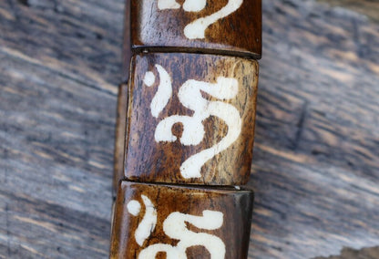 The bracelet is MAGICAL . This unique premium quality unisex elastic band bracelet with AUM.