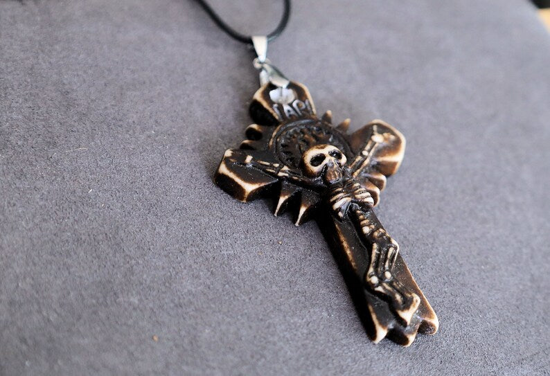 A skeleton on a cross pendant, Handmade old Carved Amulet. Ethnic & Regional Style South American. handmade figures