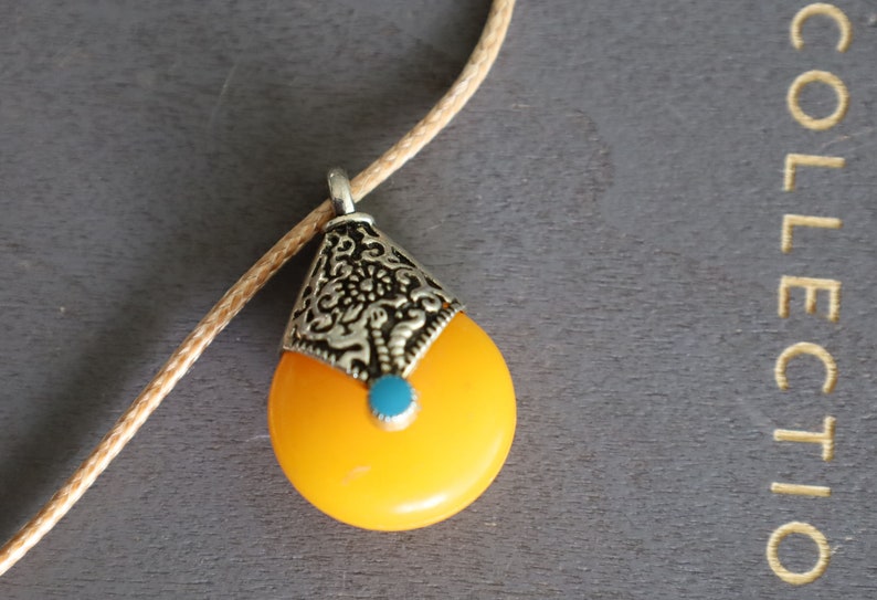 Unique original Nepal charm in antique silver tone. Alloy pendant. Cultural Connection, Travel and Adventure.