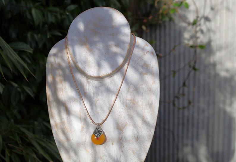 Unique original Nepal charm in antique silver tone. Alloy pendant. Cultural Connection, Travel and Adventure.