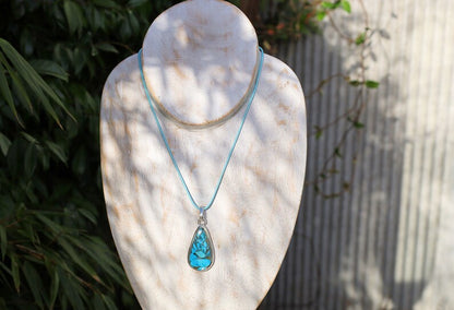A natural Chrysocolla silver 925 pendant combines the symbolism of Chrysocolla as a gemstone and the design of a style necklace