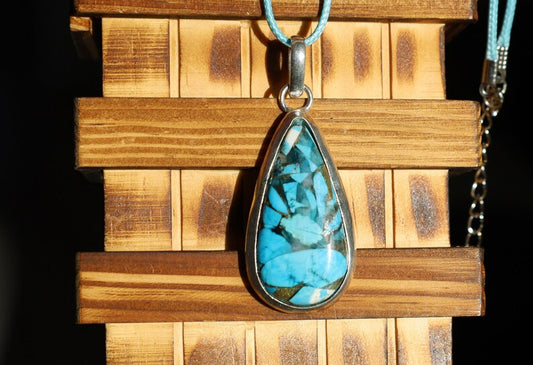 A natural Chrysocolla silver 925 pendant combines the symbolism of Chrysocolla as a gemstone and the design of a style necklace