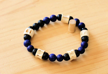 Real tribal Snake Vertebrae, Natural Bone Beads combined with Lapis Lazuli  and black Agate. The serpent jewelry teaches us purification.