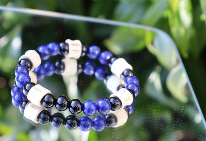 Real tribal Snake Vertebrae, Natural Bone Beads combined with Lapis Lazuli  and black Agate. The serpent jewelry teaches us purification.