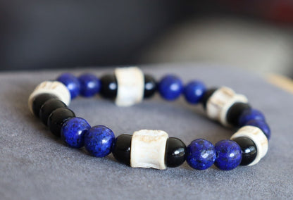Real tribal Snake Vertebrae, Natural Bone Beads combined with Lapis Lazuli  and black Agate. The serpent jewelry teaches us purification.