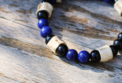 Real tribal Snake Vertebrae, Natural Bone Beads combined with Lapis Lazuli  and black Agate. The serpent jewelry teaches us purification.