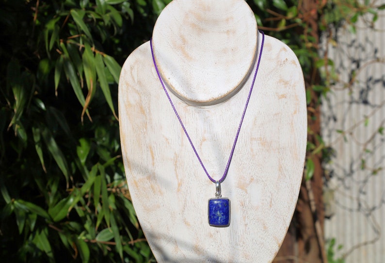 Gorgeous Lapis Lazuli 925 Silver Plated Handmade Pendant   Lapis lazuli is a deep-blue metamorphic rock that has been prized since antiquity for its intense color