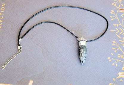 925 Silver Plated-Orthoceras   An Orthoceras pendant incorporates the fossilized remains of an ancient marine cephalopod that lived over 400 million years ago