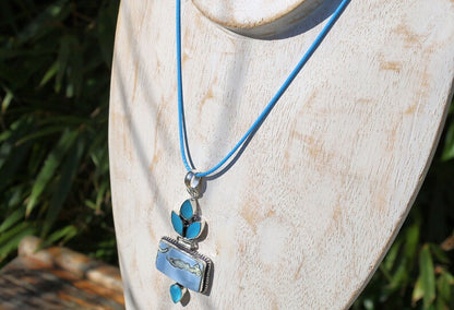 Owhyee Blue Opal and Blue Chalcedony   925 Silver Plated Handmade Pendant   Owyhee Blue Opal and Blue Chalcedony are both serene, blue-colored gemstones that exude calm and soothing energies