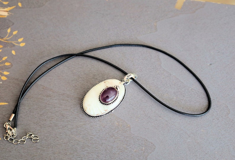 Scolecite, Amethyst 925, silver plated pendant.  Scolecite and Amethyst are both powerful crystals in the metaphysical world, each with unique properties and energies.