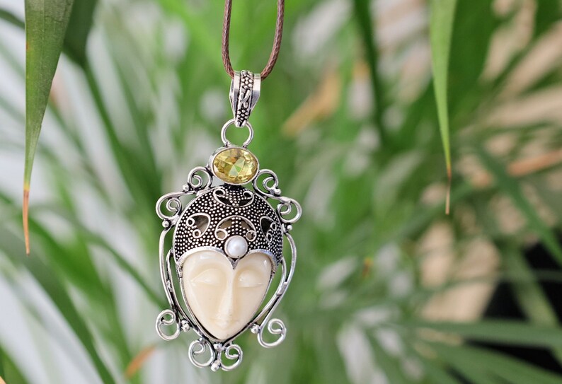 925 Silver Plated-Carved Face  Moonstone with Citrine. Bali Godess. the mystical and soothing energies of Moonstone with the vibrant and positive energies of Citrine