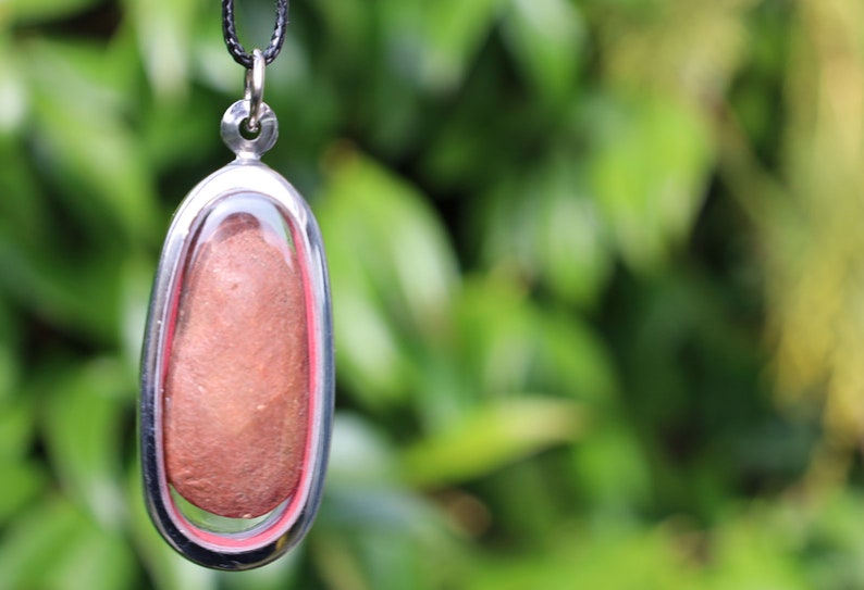 The Phra Khun Phaen (Split Egg) amulet created by Luang Por Dee of Wat Phra Rup in Suphanburi  is a unique and highly revered artifact