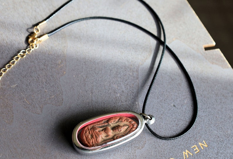 The Phra Khun Phaen (Split Egg) amulet created by Luang Por Dee of Wat Phra Rup in Suphanburi  is a unique and highly revered artifact
