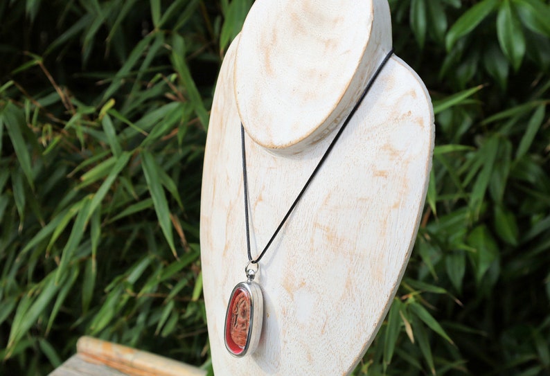 The Phra Khun Phaen (Split Egg) amulet created by Luang Por Dee of Wat Phra Rup in Suphanburi  is a unique and highly revered artifact
