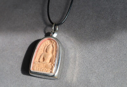 The Phra Soon Ko Song Knock, often referred to as the "Wealthy Buddha" amulet, is a fascinating piece within Thai Buddhist amulet culture