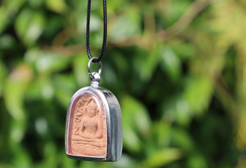 The Phra Soon Ko Song Knock, often referred to as the "Wealthy Buddha" amulet, is a fascinating piece within Thai Buddhist amulet culture
