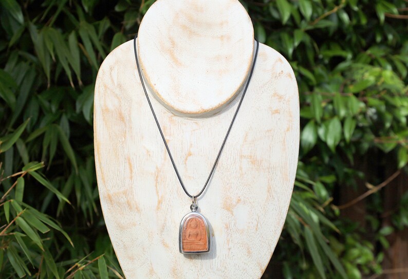 The Phra Soon Ko Song Knock, often referred to as the "Wealthy Buddha" amulet, is a fascinating piece within Thai Buddhist amulet culture