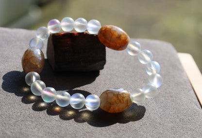Three Dzi  barrel bead Agate bracelet with Matte Aurora Crystal Glass Beads," also known as "Frosted Mystic Aura Mermaid Beads