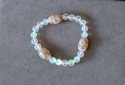 Three Dzi  barrel bead Agate bracelet with Matte Aurora Crystal Glass Beads," also known as "Frosted Mystic Aura Mermaid Beads