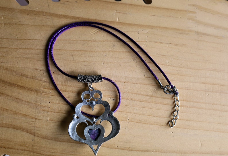 925 Silver Plated purple b/w Calsilica  Calsilica,, is a man-made material known for its distinctive, highly individual appearance and vibrant layers of bold color.