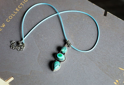 Green Calsilica pendant necklace. Traditionally, it's believed to bring healing and protective qualities