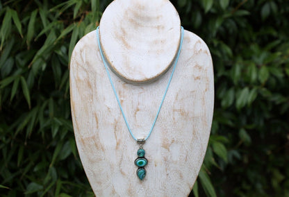 Green Calsilica pendant necklace. Traditionally, it's believed to bring healing and protective qualities