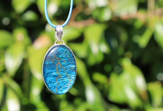 Fiery Labradorite Silver Plated Pendant. Fiery Labradorite refers to a high-quality form of Labradorite that exhibits a particularly vibrant play of colors, known as labradorescence