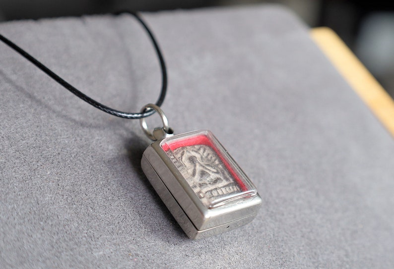 Phra Pidta Luang Pu Suk, Wat Pak Khlong Makham Thao, Chainat Province. highly revered amulet known for its protective powers
