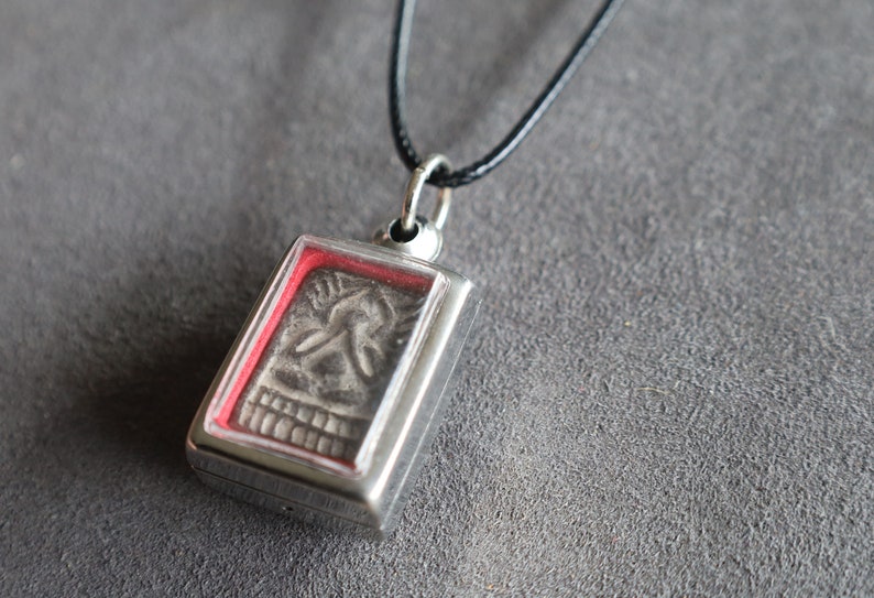 Phra Pidta Luang Pu Suk, Wat Pak Khlong Makham Thao, Chainat Province. highly revered amulet known for its protective powers