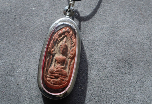 The Phra Khun Phaen (Split Egg) amulet created by Luang Por Dee of Wat Phra Rup in Suphanburi  is a unique and highly revered artifact