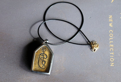 The Kun Peng+Ku Man Tong amulet represents a unique blend of Thai spiritual traditions, combining aspects of two distinct types