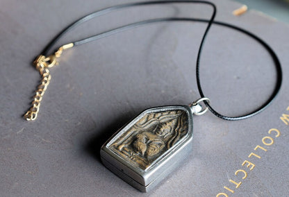 The Kun Peng+Ku Man Tong amulet represents a unique blend of Thai spiritual traditions, combining aspects of two distinct types